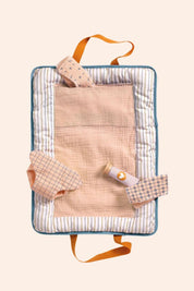 Djeco - Pomea - Changing Bag Blue Fly 
Changing bag with striped pattern and orange straps.