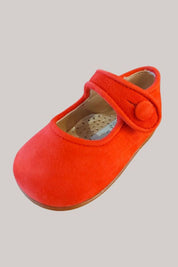 Baby Mary Jane - Red Suede - Strawberries & Cream - Ingrid Lewis - Designer 
Red children's shoe with a strap and button.