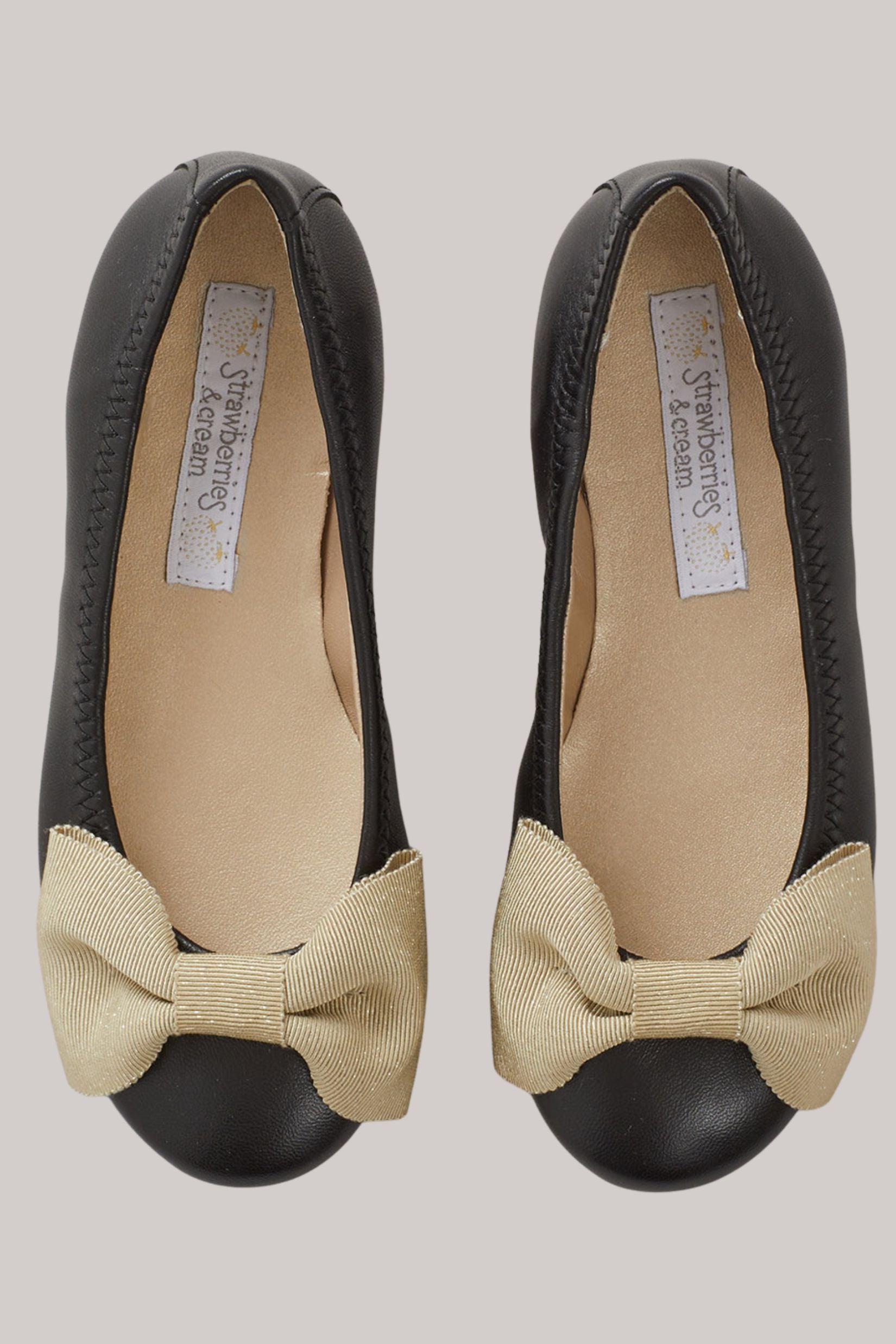 Ballerina Bow - Black - Gold Bow - Strawberries & Cream - Ingrid Lewis - Designer 
Black flats with beige bow details.