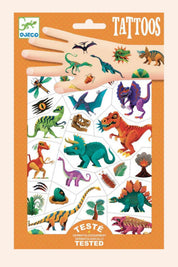 Pack of dinosaur tattoos with a hand illustration on an orange background