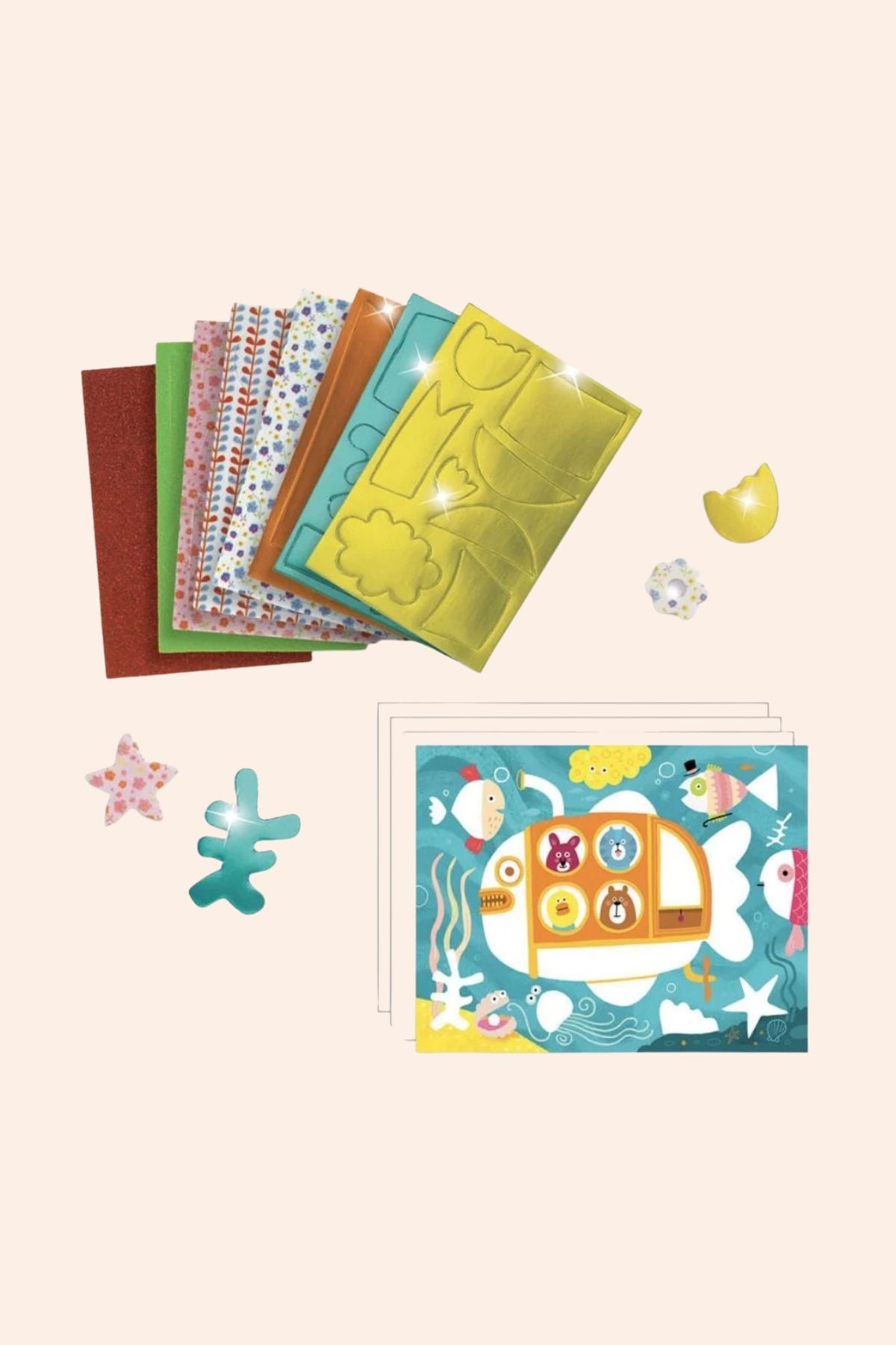 Set of colorful silicone mold sheets with a submarine-themed card on a light pink background