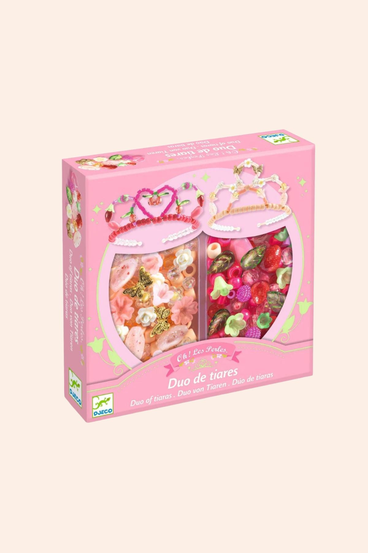 Pink packaging of a tiara set with two heart-shaped boxes on a white background
