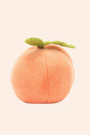 Plush toy shaped like a peach.