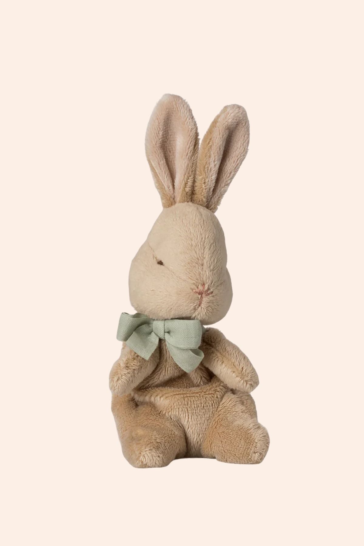Maileg - My First Bunny - Mint - Strawberries & Cream - Ingrid Lewis - Designer
Maileg Stuffed rabbit toy with a green bow tie on a beige background