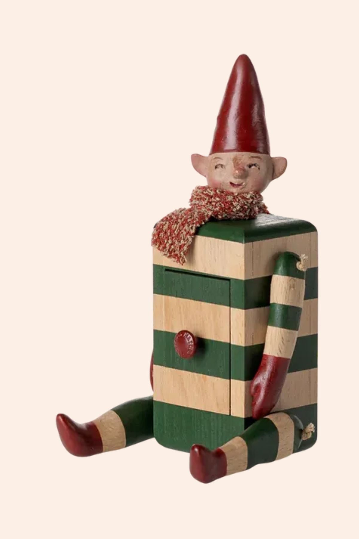 Maileg - Pixy with Drawer - Green - Strawberries & Cream - Ingrid Lewis - Designer
Wooden elf figurine with a striped outfit and red hat.