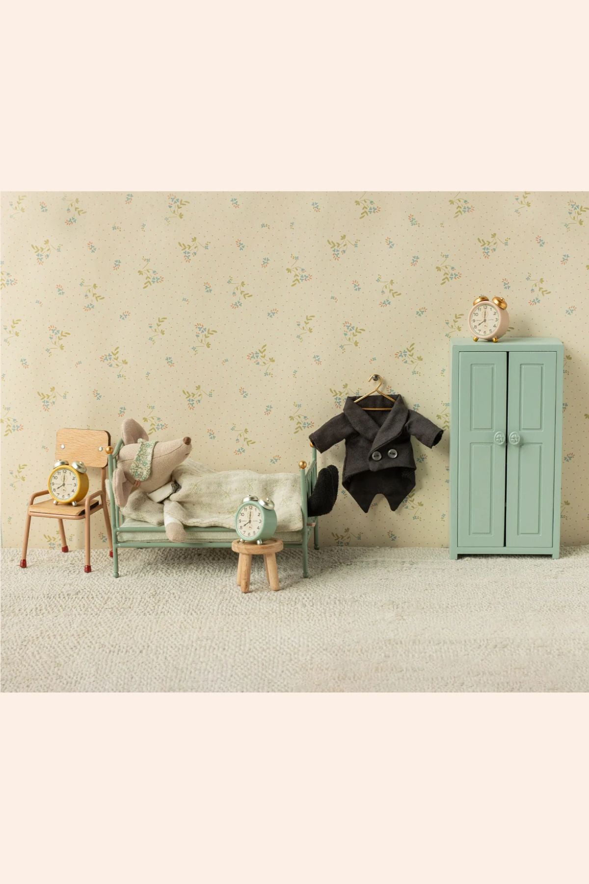 Maileg - Wedding Suit - Dad Mouse - Strawberries & Cream - Ingrid Lewis - Designer 
Miniature bedroom setup with bed, chair, wardrobe, and toys against a floral wallpapered wall.