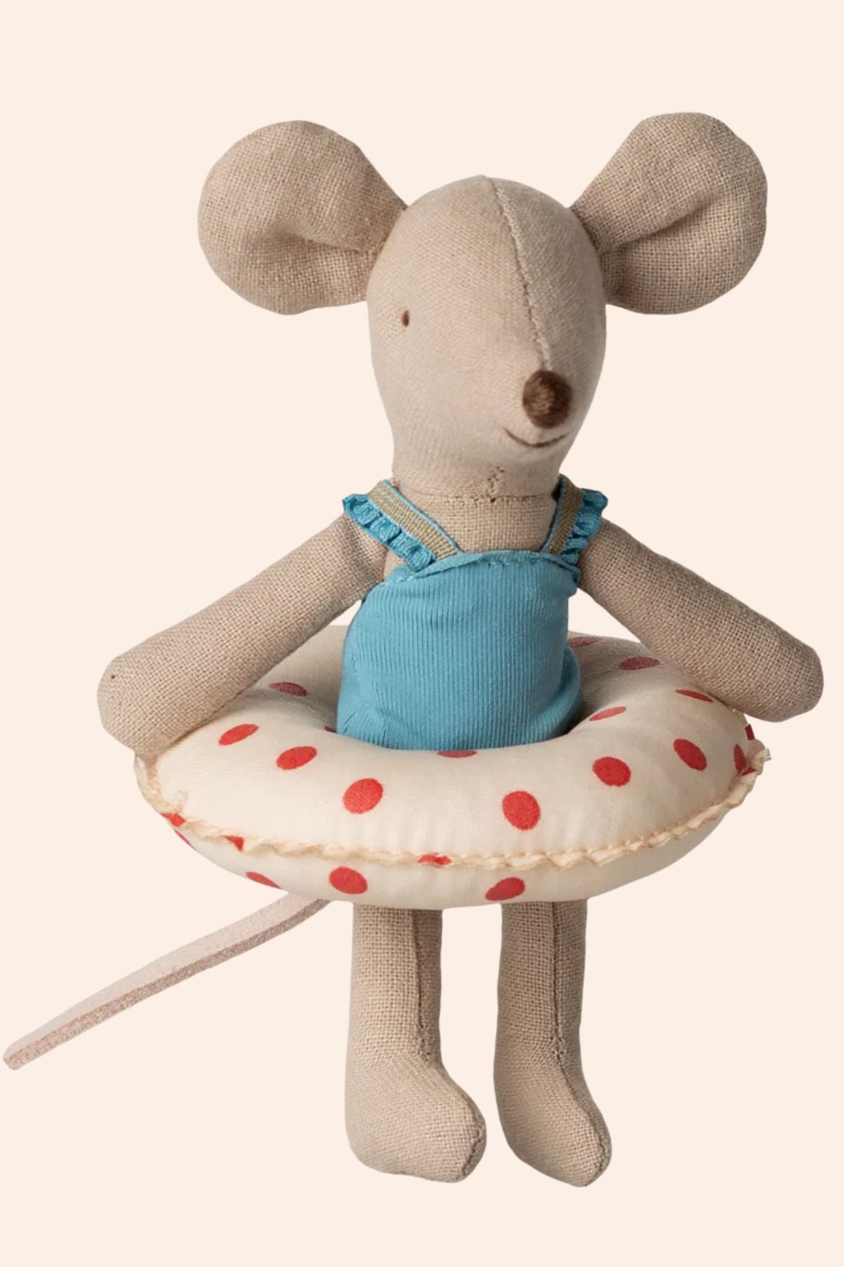 Stuffed mouse toy with a blue swimsuit and life preserver on a white background
