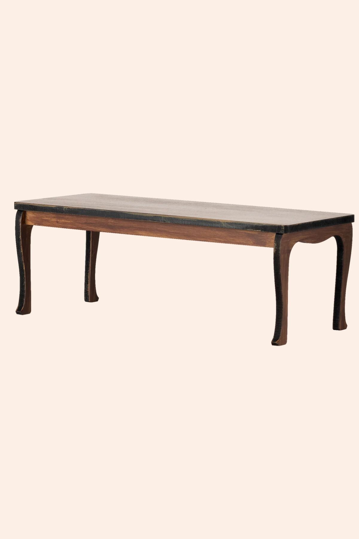 Rectangular wooden table with a marble top on a beige background