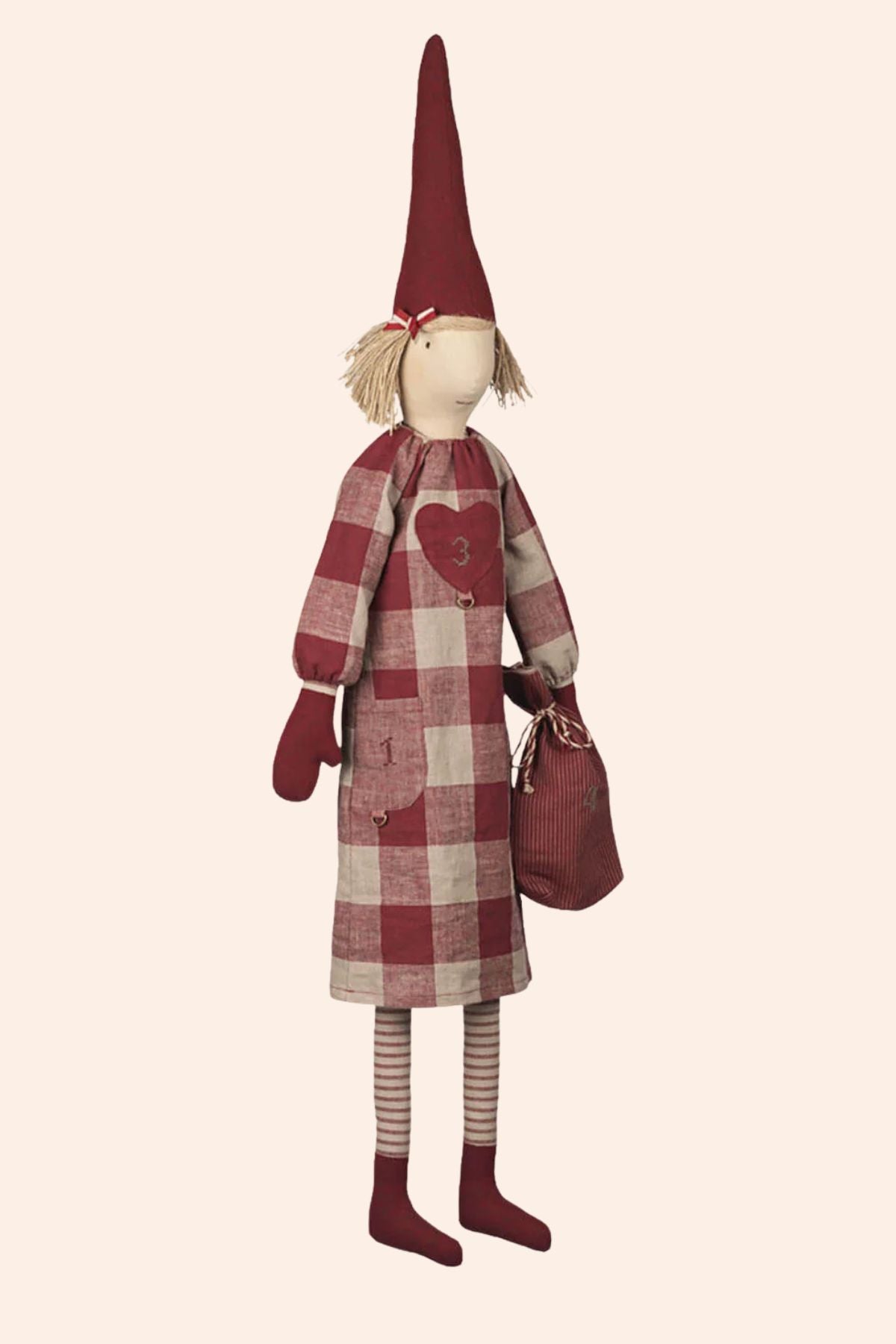 Maileg Pixy - Advent Calendar - Girl -  Strawberries & Cream - Ingrid Lewis - Designer 
Stuffed pixy doll with a red and beige checkered coat, heart-shaped pocket, and striped socks.