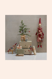 Maileg Pixy Calendar - Girl - Double Buns in Hair -  Strawberries & Cream - Ingrid Lewis - DesignerDecorative scene with small tree, figurines, and a pixy.