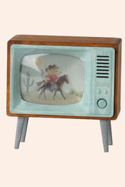 Vintage-style television set with a screen displaying an animated character on a horse.
