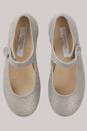 Mary Jane - Silver Leather - Strawberries & Cream - Ingrid Lewis - Designer
Pair of silver glittery shoes with a strap.