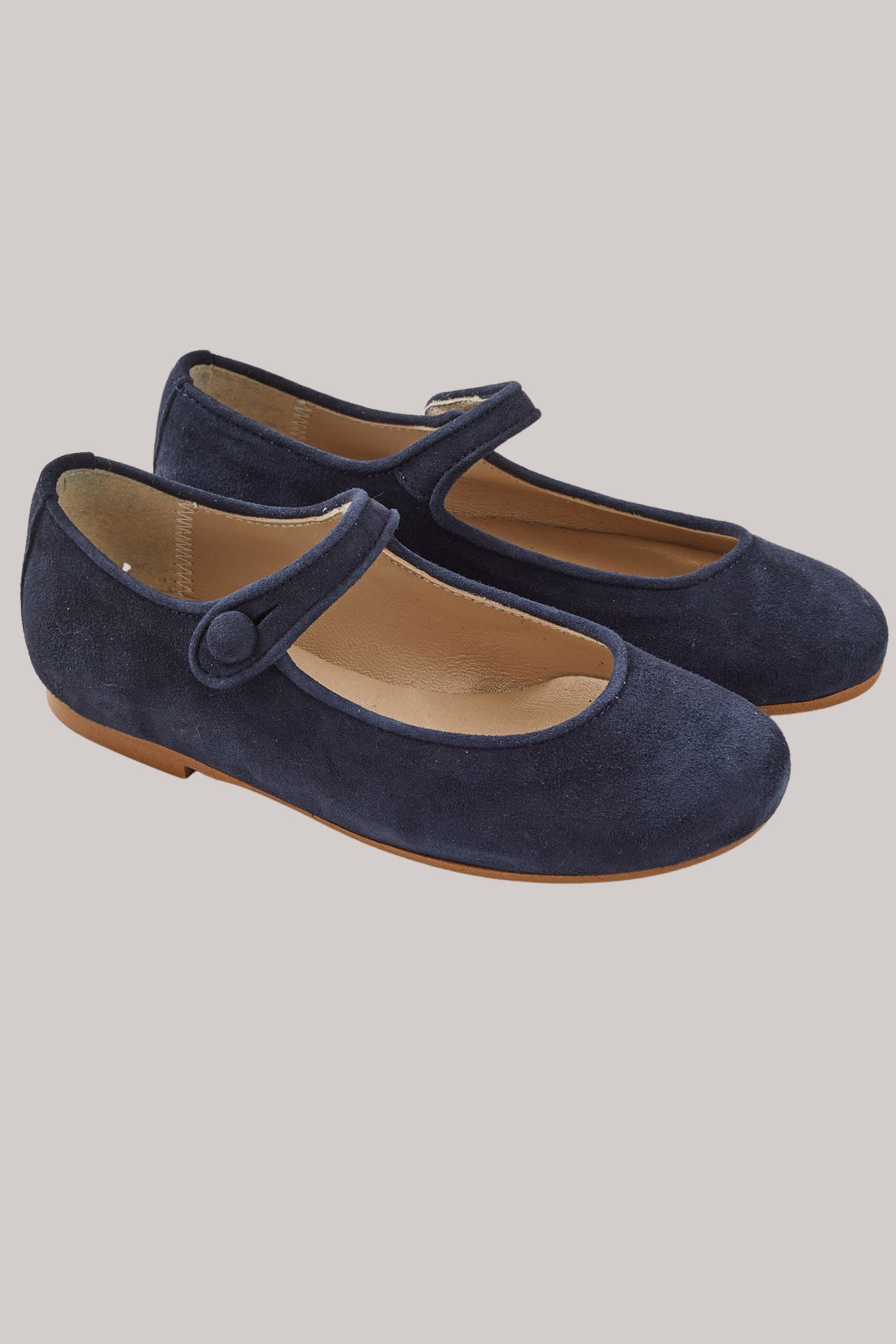 Mary Jane - Suede Navy - Strawberries & Cream - Strawberries & Cream - Ingrid Lewis - Designer 
Pair of navy blue suede shoes with a strap.
