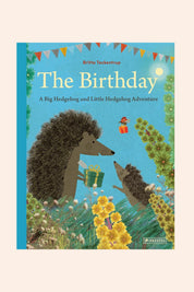 The Birthday - A Big Hedgehog and Little Hedgehog Adventure - Strawberries & Cream - Ingrid Lewis Designer
Book cover of 'The Birthday' featuring two hedgehogs and a gift, with a blue background and yellow flowers.