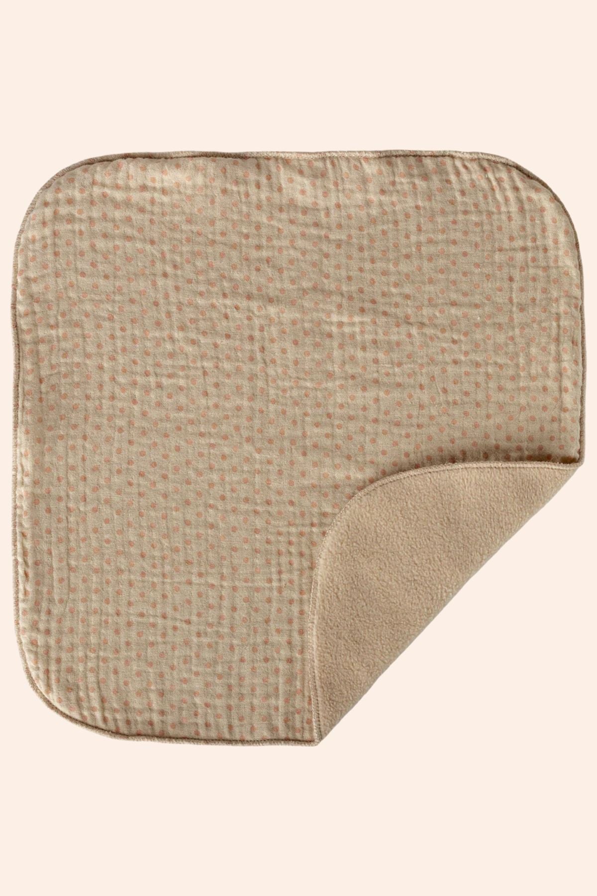 Beige textured square mat on a white background