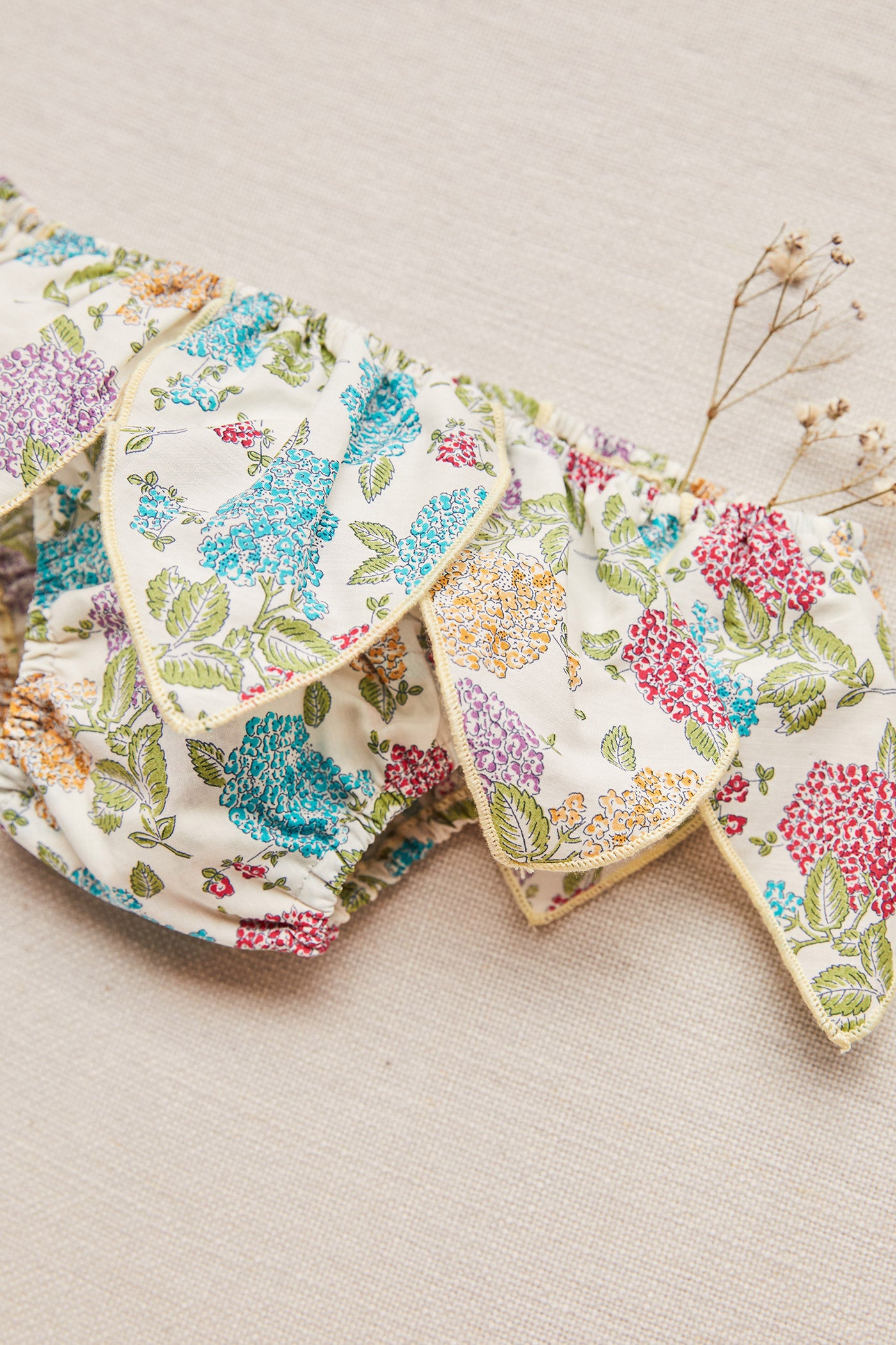 teardrop-swimwear-liberty-print-blue-purple-and-orangw-flowers-strawberries-and-cream-02.jpg